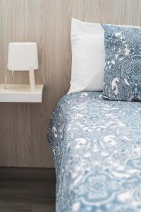 Posteľ alebo postele v izbe v ubytovaní Home2Book Sunny Beach Maspalomas Playa del Inglés