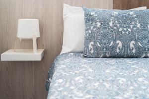 Posteľ alebo postele v izbe v ubytovaní Home2Book Sunny Beach Maspalomas Playa del Inglés