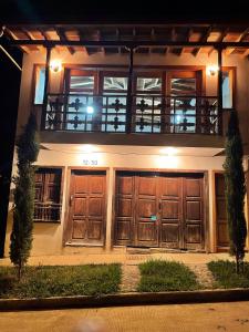 Facaden eller indgangen til Jardín Amoblados