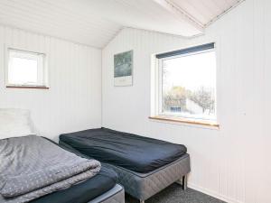 Postel nebo postele na pokoji v ubytování Holiday home Vinderup XXIII