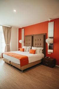 Ένα ή περισσότερα κρεβάτια σε δωμάτιο στο Hotel Boutique El Triángulo