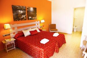Cama ou camas em um quarto em Hotel Ca Marí