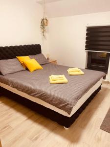 Postel nebo postele na pokoji v ubytování Masha Apartment