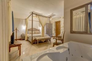 Кровать или кровати в номере Navalia Hotel