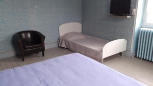 Postel nebo postele na pokoji v ubytování Gite des Belles Fontaines