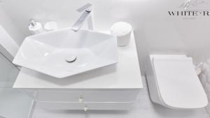 Kúpeľňa v ubytovaní Apartament White R parking w cenie!!!