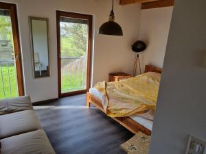 Giường trong phòng chung tại Appartement Hard Bodensee