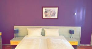 Een bed of bedden in een kamer bij Hotel-Restaurant Kastel