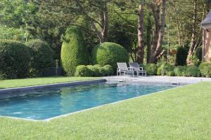 Swimmingpoolen hos eller tæt på B&B L'Orangerie