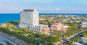 an aerial view of a city with a tall building at Long Thuan Hotel & Resort in Phan Rang