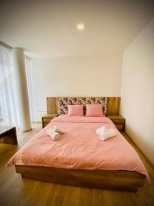 Postel nebo postele na pokoji v ubytování Hotel Perla