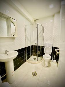 Koupelna v ubytování Hotel Perla
