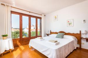 Postel nebo postele na pokoji v ubytování Villa Spring Hill - Cala Galdana + 19 fotografií
