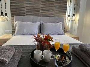 Postel nebo postele na pokoji v ubytování Onar Luxury Apartment