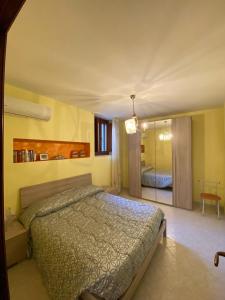 Postel nebo postele na pokoji v ubytování La casa dei Venti