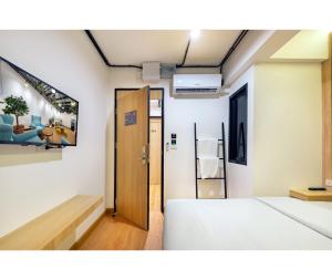 En eller flere senge i et værelse på Siam Subway Hostel and Café