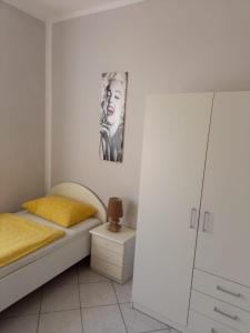 Postel nebo postele na pokoji v ubytování Apartment Smajlovic + 27 fotografií