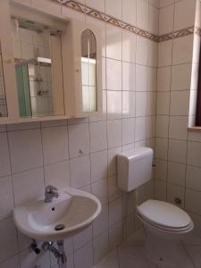 Koupelna v ubytování Apartment Smajlovic