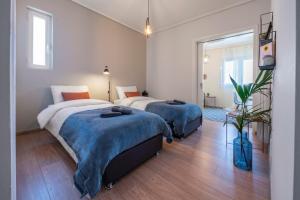 Posteľ alebo postele v izbe v ubytovaní Bright 3bdr Apt with Roofgarden, Jacuzzi