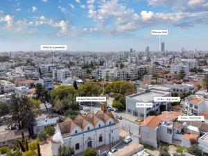 an aerial view of a city with buildings at To Hani - Small Studio in Nicosia +1 photo