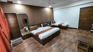 Rúm í herbergi á Hotel Nova Prime
