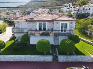 a villa with a view of the yard at Tyros Boutique Houses Villas in Tyros