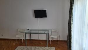 TV a/nebo společenská místnost v ubytování BigCitty Rooms + 34 fotografií