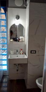 Ein Badezimmer in der Unterkunft Casa alfredo botteghelle