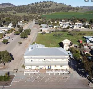 an aerial view of a building in a small town at Wilmington Hotel in Wilmington