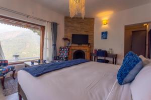 Letto o letti in una camera di Seclude Ramgarh Willows