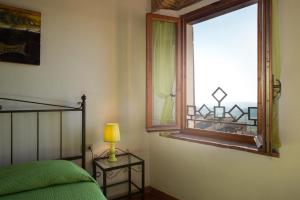 Postel nebo postele na pokoji v ubytování Casa Aurora