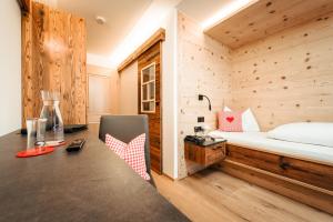 Postel nebo postele na pokoji v ubytování Gästehaus Mathies