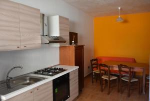 Köök või kööginurk majutusasutuses la perla dello ionio
