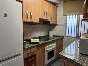 Kuchyň nebo kuchyňský kout v ubytování Apartamento Los Califas a 100m de la Catedral