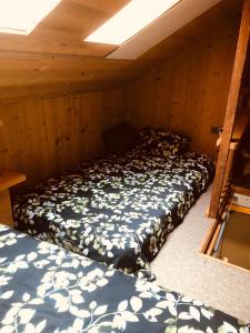 Ένα ή περισσότερα κρεβάτια σε δωμάτιο στο Gite l'Ancolie +20 φωτογραφίες