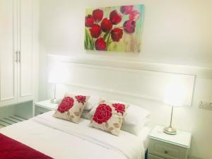 Katil atau katil-katil dalam bilik di Dergvale Hotel
