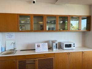 Una cocina o kitchenette en 熱海温泉　実の別荘
