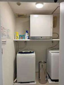 Una cocina o kitchenette en 熱海温泉　実の別荘
