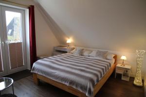 Postel nebo postele na pokoji v ubytování Gästehaus Gudrun