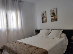 Postel nebo postele na pokoji v ubytování Porto do Rio