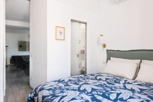 Postel nebo postele na pokoji v ubytování Idyllia lighty flat with views in Trastevere