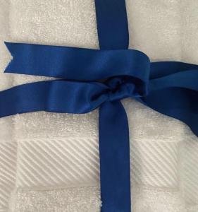 A bed or beds in a room at Il gallo di Eracle - Charming suites & rooms