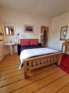Ένα ή περισσότερα κρεβάτια σε δωμάτιο στο Alma House Bed and Breakfast