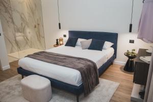 Postel nebo postele na pokoji v ubytování SCIABICA SUITE - Sicilian Experience