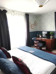 Letto o letti in una camera di Strand Hotell