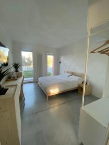 Postel nebo postele na pokoji v ubytování Olea b&b