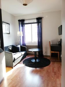 Area soggiorno di Strand Hotell
