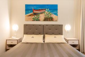 Postel nebo postele na pokoji v ubytování Hotel Atlantico