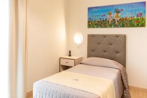 Postel nebo postele na pokoji v ubytování Hotel Atlantico