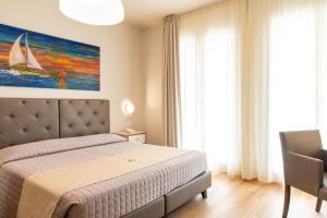 Postel nebo postele na pokoji v ubytování Hotel Atlantico